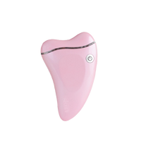 Gua sha face massaging and sculpting device. pink - skiin beauty co