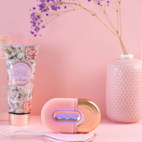 Silicone face cleansing beauty device for clear skin with LED lights. Pink colour - skiin beauty co